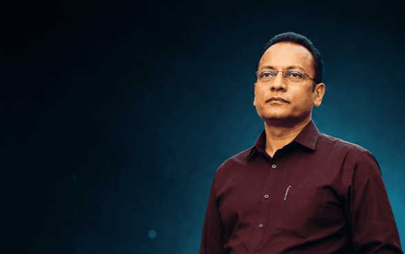 RK Singh standing mentor portrait